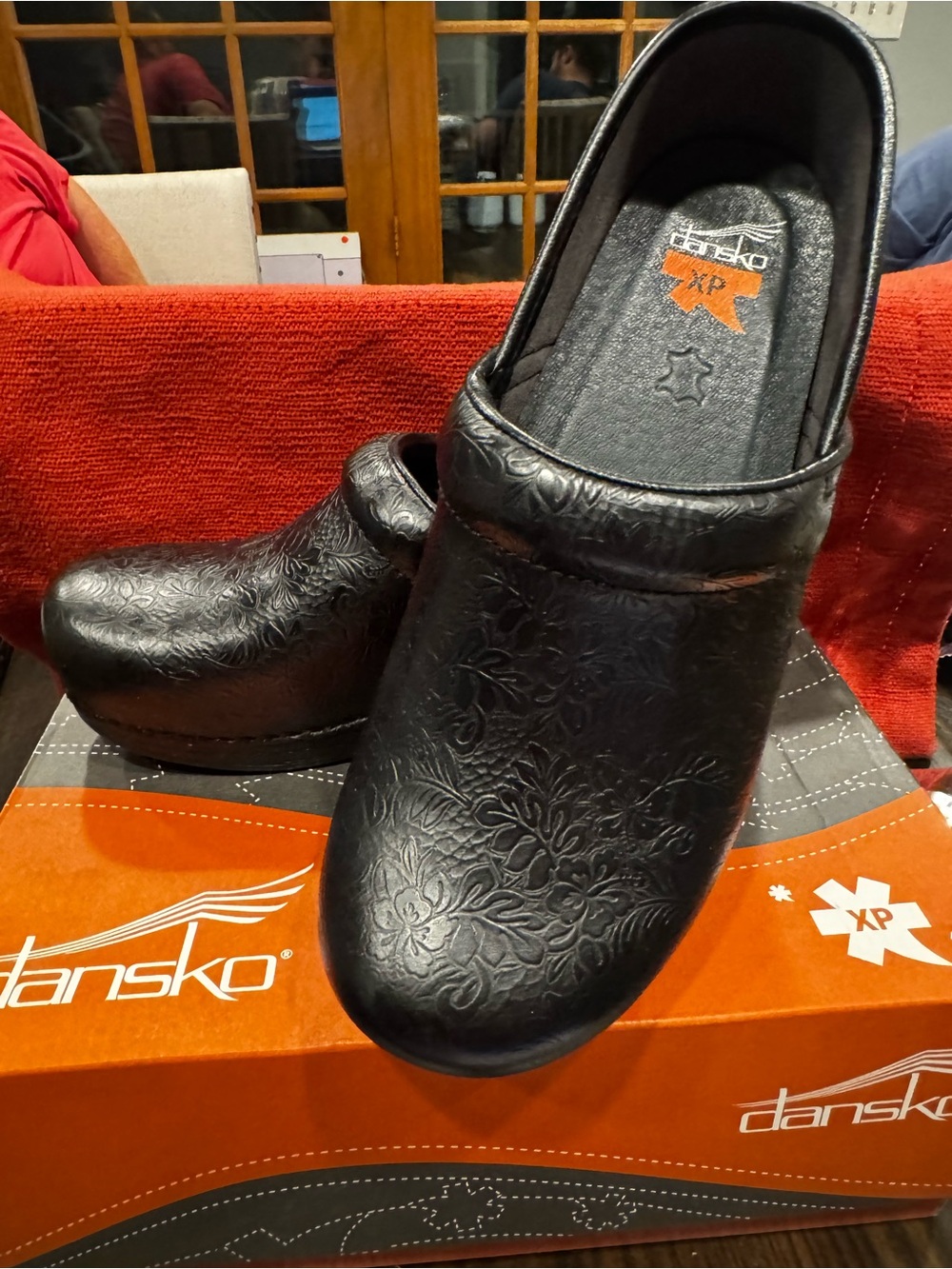 Dansko Black Floral Embossed Leather Women's Clogs
